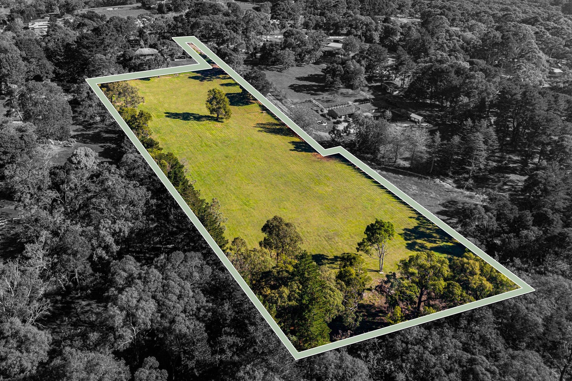 Aerial from the rear, the block outlined in blue with the surrounds dropped back to grey