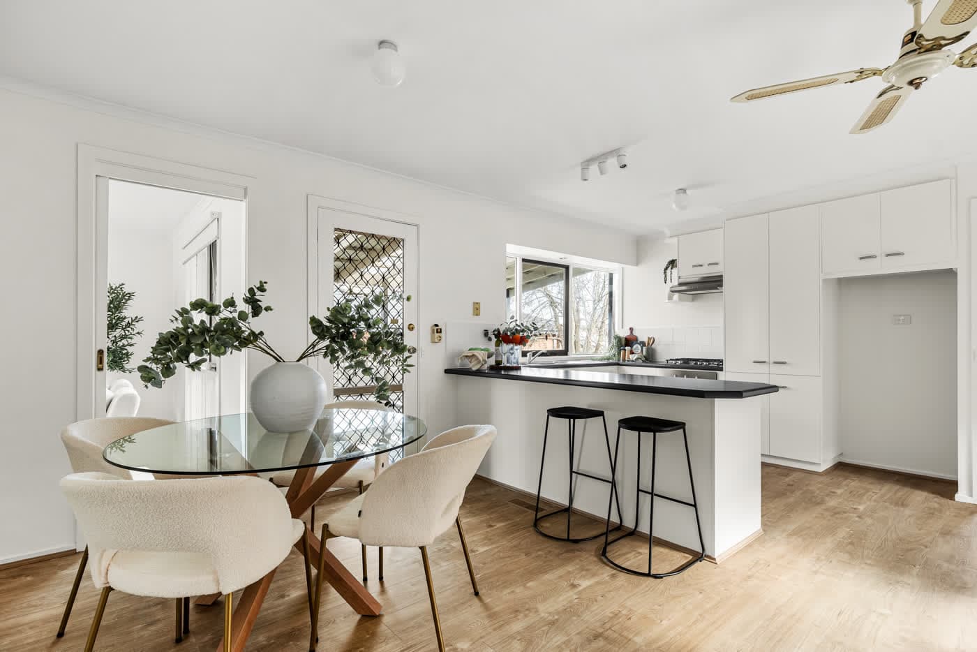 Dining area beside a compact kitchen