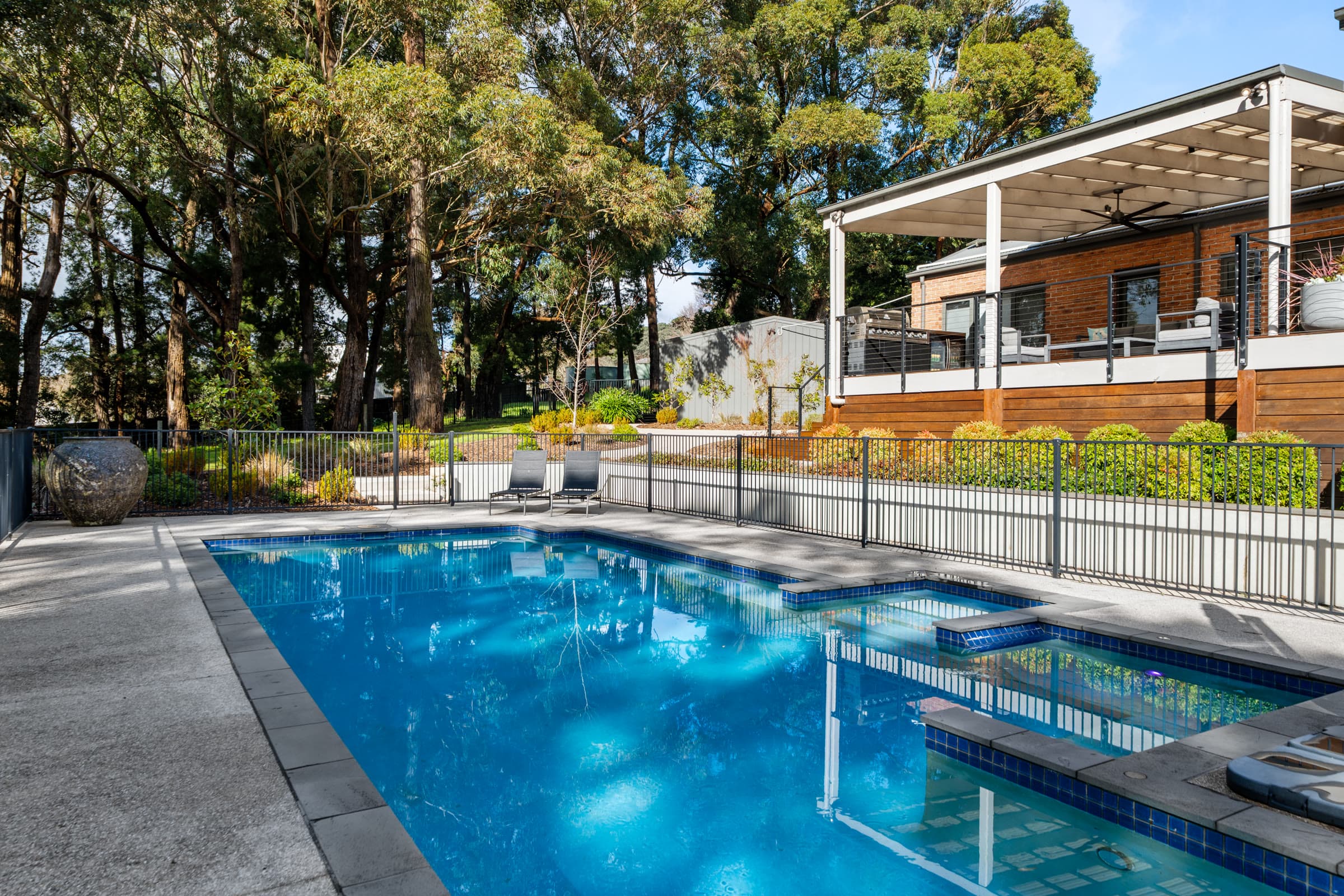Pool and treed garden of an acreage home, Beaconsfield Upper